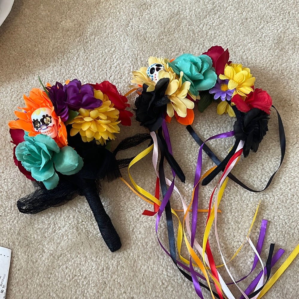 Halloween women’s head band and flowers. Used one time.